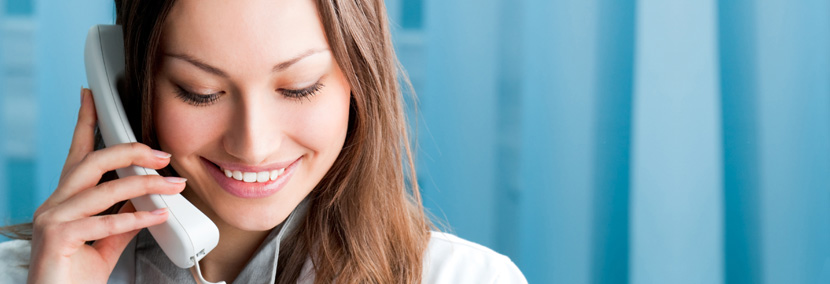 image of woman happy talking on the phone to a psychic