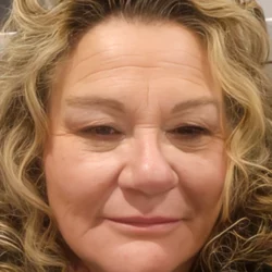 Psychic Gail close-up portrait with curly hair