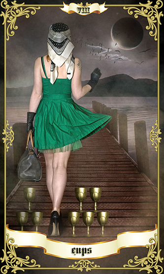 8 of cups tarot card showing a woman in a green dress walking away surrounded by 8 golden cups