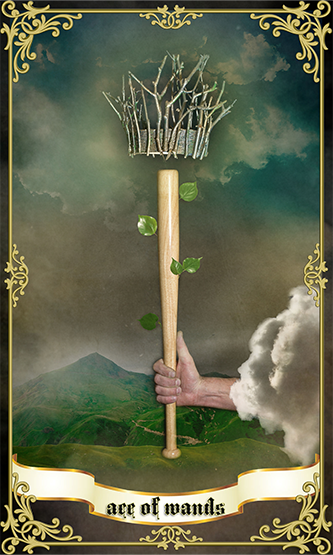 Ace of Wands tarot card featuring a mystical hand emerging from the clouds, gripping a wooden wand adorned with green leaves. The top of the wand transforms into a crown-like structure of intertwined branches. A mountainous landscape with a dramatic sky forms the background, symbolizing inspiration, new beginnings, and creative energy.